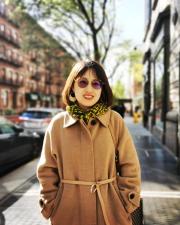 Picture of Xiaoyan Li on a city street 